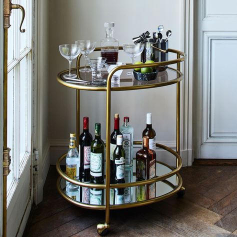 Albee Bar Cart | West Elm West Elm Bar Cart Styling, Bar Cart Under Window, Art Deco Bar Cart Styling, Bar Cart With Decanters, Oval Bar Cart, Small Round Bar Cart, Bar Cart Entryway, Bar Cart Items, Glass Bar Cart Styling