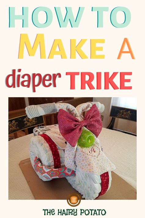 If you have a friend or relative having a baby soon you should think about making them a diaper tricycle. They will absolutely LOVE it! #diapercake #diapertricycle #diapers #babybibs #babyblanket Diy Diaper Cake Tutorial, Diaper Tricycle, Diaper Cakes Tutorial, Diy Diaper Cake, Diaper Gifts, Diaper Cake Boy, Baby Bike, Baby Shower Crafts, Baby Diaper Cake