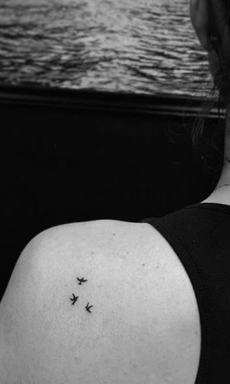 Tiny Mockingbird Tattoo, Bird Friendship Tattoos, Micro Shoulder Tattoo, Small Tattoos Representing Family, 3birds Tattoo, Small Bird Silhouette Tattoo, Micro Bird Tattoos For Women, Tiny Dove Tattoos For Women, Meaningful Micro Tattoos