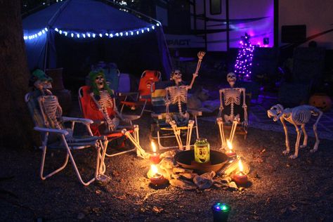 decorated campsite Halloween Decorated Campsites, Halloween Campsite Themes, Haunted Campsite Ideas, Halloween Themed Campsite, Campers Decorated For Halloween, Halloween At The Campground, Halloween Campsite Decorating Ideas, Skeleton Camping Decorations, Halloween Camping Decorations