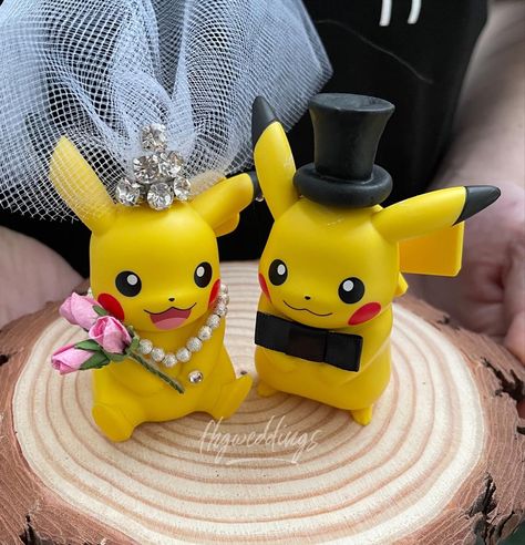 Perfect for gamer loving couples! #pikachu #pokemon #gamerwedding #pokemonwedding Pokemon Wedding, Alternative Wedding Decorations, Dinosaur Wedding Cake, Dinosaur Wedding, Gamer Wedding, Pikachu Plush, Groom Wedding Cakes, Offbeat Bride, Fantasy Wedding