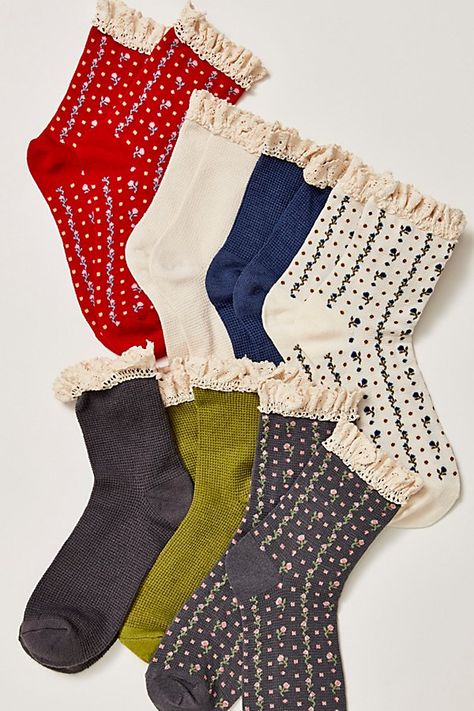 A necessary addition to your sock drawer, this so essential pack features 7 pairs of ultra-soft socks in an ankle-height with feminine ruffled trim, waffle knit details, and dainty floral prints. * 7 pairs of socks * Seamed heel + toe | The Ultimate Sock Pack by Free People Cute Boot Socks, Free People Socks, Vintage Socks Aesthetic, Feminine Socks, Dainty Socks, Cute Socks Aesthetic, Cottagecore Socks, Christmas Gifts Women, Mission Fits