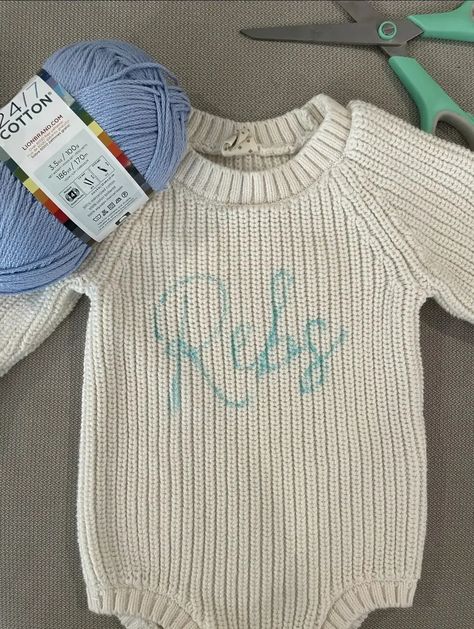 How To DIY a Hand Embroidered Name Sweater • Emily Rone Home Name Embroidered Sweater Diy, Chunky Name Sweater Diy, Crochet Name On Sweater Diy, How To Embroider Clothes By Hand, Diy Personalized Sweater, Diy Hand Embroidered Sweater, Embroidered Sweater Kids, Name On Sweater Diy, Baby Sweater Embroidery Name Diy