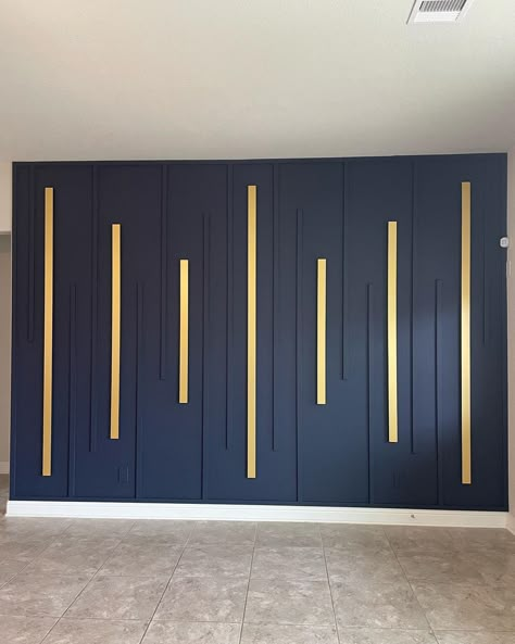 Livings Room Wall color Noval #accentwall #accentwalls #livingroomdecor #livingroomideas #noval #novalcolor #gold #blueandgold… | Instagram Grey And Gold Accent Wall, Accent Wall With Gold Trim, Tile Feature Wall Living Room, Blue Salon Decor Interiors, Accent Wall Black And Gold, Office Room Accent Wall, Long Accent Wall Living Rooms, Blue And Gold Accent Wall, Art Deco Feature Wall