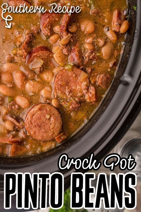 Close up of a corner of a crock pot filled with pinto beans and smoked sausage. Overnight Crockpot Meals, Slow Cooker White Beans, White Beans And Sausage, Southern Pinto Beans Recipe, Crock Pot Pinto Beans, Slow Cooker Pinto Beans, Sausage Crockpot Recipes, Beans Recipe Crockpot, Pinto Beans Recipe