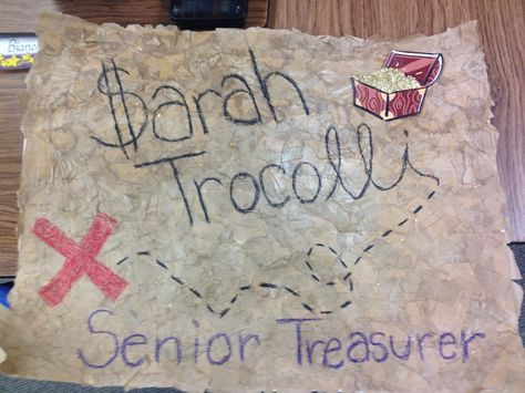 Running for class treasurer?? Here's a campaign poster idea! Rip up brown paper or brown paper lunch sacks and glue the prices to a board. Coat in glue then use crayon or paint to write your name and your slogan! It makes it look like a treasure map and everyone was really impressed! Asb Treasurer Poster Ideas, Sga Treasurer Poster Ideas, Student Council Campaign Posters Treasure, Campaign Posters For Treasurer, Poster For Treasurer, Student Treasurer Poster Ideas, Running For Treasurer Posters, Stuco Treasurer Posters, Posters For Treasurer