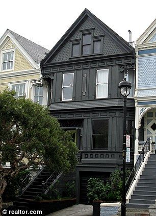 The owners of the Queen Anne Victorian in Duboce opted for a dark charcoal grey color to give the home more character. Follow us: @MailOnline on Twitter | DailyMail on Facebook Dark Grey Victorian House Exterior, Black Victorian House, Exterior Gray Paint, Best Exterior Paint, Victorian Exterior, Black Houses, Black House Exterior, House Trim, Dark House