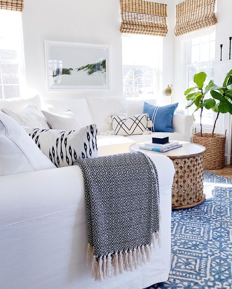 Modern coastal decor in our small living room and family room - jane at home - living room decor - white modern living room - sectional Modern Coastal Decor, Blue Rugs, Apartment Decoration, Reception Room, Hearth Room, Coastal Living Rooms, Coastal Living Room, Summer Home Decor, Decor Essentials