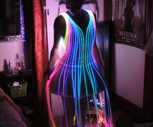 Glow In The Dark Outfit Ideas, Fiber Optic Lighting Diy, Trash Fashion Ideas, Technology Outfit, Villain Outfit Ideas, Neon Circus, Fiber Optic Dress, Light Costume, Glow Outfits