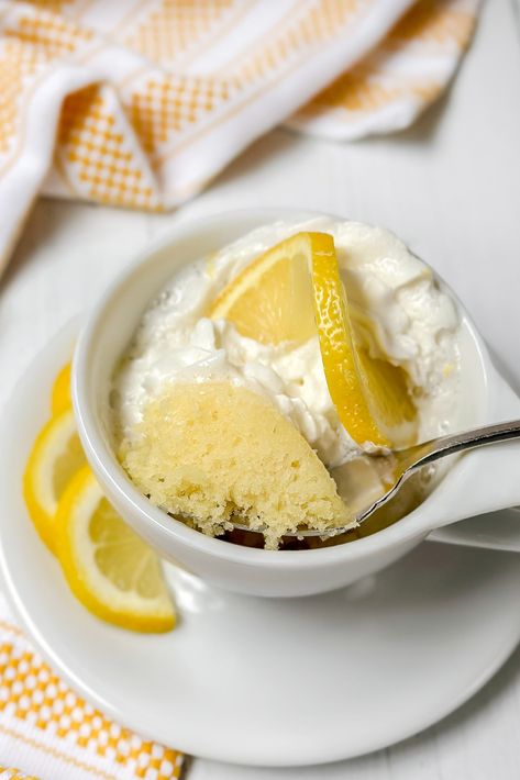 When the delicate and bright flavors of lemon cake inspire you, satisfy those cravings with a quick and easy Lemon Mug Cake. It's a delicious solution with simple ingredients and 2 minutes in the microwave for a bright and zesty spring treat! Easy Spring Treats, Carrot Cake Loaf Recipe, Cake Cravings, Carrot Cake Loaf, Lemon Mug Cake, Mug Cake Recipe, Microwave Cake, Yellow Cake Recipe, Easy Carrot Cake