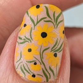 Tessa | DIY Nail Art on Instagram: "Black-Eyed Susans Tutorial 🌻🎥 • • • Polish: @whatsupnails Desert Rose, Bear Trap, Tuscan Harvest, Avocado Toast, Squished Squashed Soup @hellomaniology Straight Up Black, Smudge -Free Top Coat *Link in bio 💸* @oliveave_polish Matte Top Coat *Link in bio 💸* 🌻 Plate: @uberchicbeauty Floral Embrace 🌻 Stamper: @hellomaniology Ice Cube Stamper • • • #nailart #summernails #blackeyedsusan #floralnails #mattenails #fallnails #fallnailart #nailstamping #nailreel Black Eyed Susan Nails, Bear Trap, Rose Bear, Matte Top Coat, Diy Nail Art, Fall Nail Art, Black Eyed Susan, Black Eyed, Floral Nails