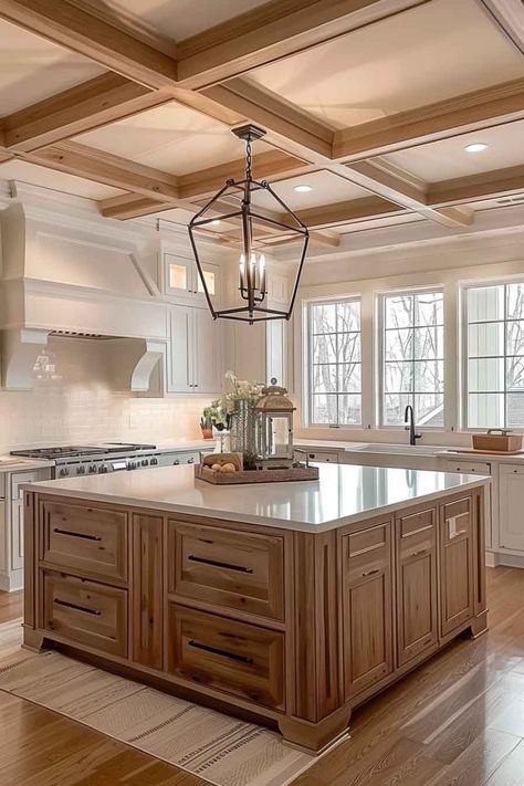 Rustic kitchen design with a large wooden island, classic lantern pendant lighting, coffered ceiling, and neutral cabinetry for a cozy and inviting feel. Wood Island In Kitchen, Kitchen Island Classic, 2 Island Kitchen, Kitchen With Wooden Island, Charleston Kitchen, Wood Coffered Ceiling, 1910 House, Beautiful Houses Exterior, Neutral Bedroom Design