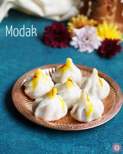 Modak is a sweet dumplings made from rice flour offered as prasad to Hindu God Ganesha during the festival of Ganesh Chaturthi. It is also called Ukadiche modak in Maharashtra which means 'Steamed modak'. In this post, let's see how to make this easily at home especially with step by step images and video for... Read More The post Modak Recipe | Ukadiche Modak appeared first on Raks Kitchen. Modak Sweet Images, Ukadiche Modak, Modak Recipe, Marathi Culture, Fast Cooking, Sweet Dumplings, How To Make Dough, Navratri Images, Happy Navratri