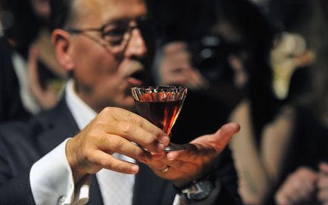 Bar owner Salvatore Calabrese holds the world's most expensive cocktail, priced at £5,500 at the Playboy Club in London. The ingredients used included 40ml 1778 Clos de Griffier Vieux Cognac, 20ml 1770 Kummel Liqueur, 20ml circa 1860 Dubb Orange Curacao and 1900s Angostura Bitter. The cocktail was mixed and sold to an unidentified patron at Salvatore's bar at London's Playboy Club. Manly Cocktails, Cocktail Pictures, Bar Owner, Job Fair, Angostura Bitters, Pictures Of The Week, Cocktail Making, Play Music, Most Expensive