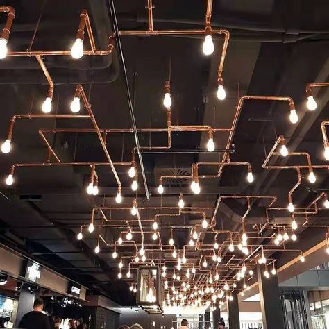 Drop Ceiling Restaurant, Restaurant Statement Wall, Restaurant Ceiling Lighting, Restaurant Lighting Ideas Ceilings, Restaurant Ceiling Lights, Ceiling Light Bar, Industrial Lighting Design, Industrial Cafe, Open Ceiling