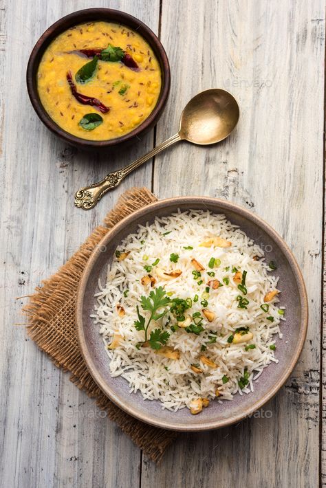 Garlic Fried Rice by stockimagefactory. Garlic Fried Rice Or Pulav using Basmati Rice & Lahsun, served with Dal Tadka over moody background #Sponsored #stockimagefactory, #Pulav, #Basmati, #Garlic Indian Garlic Rice, Sambar Rice Photography, Rice And Curry Photography, Chicken Rice Photography Food, Fried Rice And Chicken Photography, Garlic Fried Rice, Garlic Fries, Basmati Rice, Fried Rice