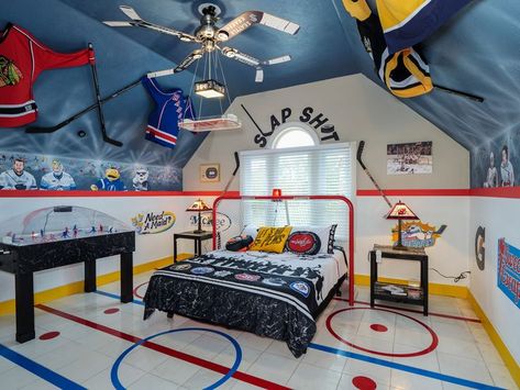 This themed bedroom is one of 12 - It's a luxury vacation rental resort where every room is about a different sport! Hockey Beds, Hockey Kids Room, Ice Hockey Room, Boys Hockey Bedroom, Hockey Themed Room, Hockey Bedding, Hockey Room Decor, Sports Themed Bedroom, Hockey Bedroom