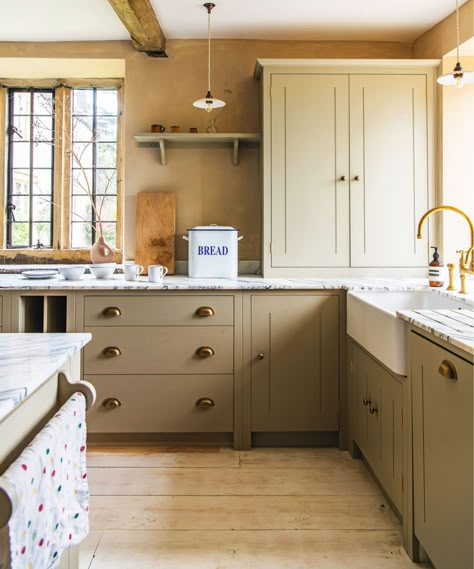 9 outdated kitchen cabinet trends to avoid, according to experts | Warm Taupe Kitchen Cabinets, Manchester Tan Cabinets, Light Tan Kitchen Cabinets, Cream Cabinet Kitchen, Counter To Ceiling Cabinets, Rta Cabinets Kitchens, Tan Kitchen Cabinets, Kitchen Trends To Avoid, Neutral Kitchen Cabinets