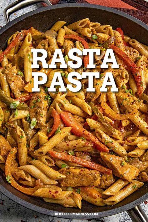 This rasta pasta recipe gives Italian pasta a Jamaican spin with creamy coconut milk, lots of spicy jerk seasoning and huge flavor. Rasta Pasta Jamaican Recipe Chicken, Rasta Pasta Jerk Chicken, Rasta Pasta Easy, Rasta Pasta Jamaican Chicken, Rasta Pasta Jamaican, Jamaican Rasta Pasta Recipe, Jerk Chicken Pasta, Rasta Pasta Recipe, Cultural Dishes