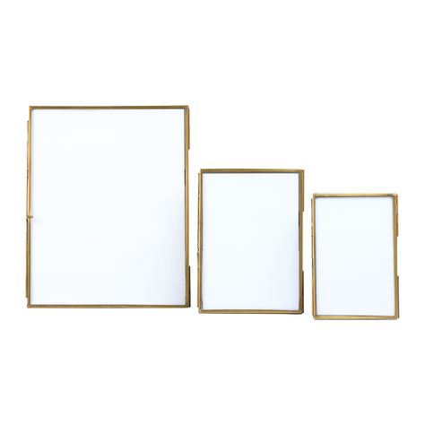 "Shop the 3 Pack Gold Brass Framed Photo Frame at Michaels. com. It doesn’t get much simpler (or better) than this. It doesn’t get much simpler (or better) than this. With two pieces of clear glass held firmly together by a simple gold finish frame and clasp closure, these effortless frames help bring the focus on what’s inside. Perfect for displaying a special photo, an inspiring quote, or a favorite print. Details: Gold finish 3 frames Metal and brassSize Information: Small: 4\" x 6\" Medium: Golf Pictures, Gold Photo Frames, Hello Honey, Picture Frame Sets, Gold Brass, Brass Frame, Frame Set, Photo Frames, The 3