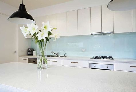 White Kitchen With Glass Backsplash, Glass Backsplash Kitchen White Cabinets, White Kitchen Glass Backsplash, Painted Glass Backsplash Kitchen, Glass Backsplash With White Cabinets, Blue Splashback Kitchen, Back Painted Glass Kitchen, White Glass Backsplash, Kitchen Glass Backsplash