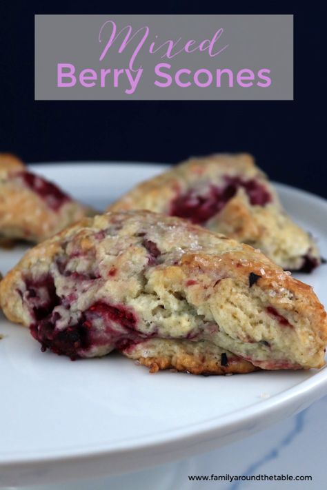 Close up of a mixed berry scone on a cake stand. Mixed Berry Scones, Fruit Scones Recipe, Easy Scones, Brunch Pastries, Berry Scones, Blueberry Scones Recipe, English Scones, Scone Recipes, Fruit Scones