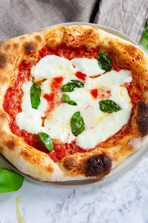 You'll feel like you're sitting in your favorite pizzeria when you eat this homemade pizza dough! #recipe #homemade #pizzeria #dough #pizza Bubble Pizza, Freeze Pizza Dough, Four Cheese Pizza, Margherita Pizza Recipe, Best Pizza Dough Recipe, Pasta Per Pizza, Neapolitan Pizza, Best Pizza Dough, Pizza Recipes Homemade