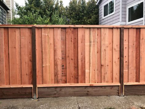 There are lots of options and components when it comes to wood fences. Besides styles and wood types, there are also choices like kickboards. Check out our post to see what a kickboard is, what it’s used for, and why you should have one. Bottom Fence Border, Bottom Fence Gap Filler Ideas, Gaps Under Fence Ideas, Bottom Of Fence Gap Ideas, Fence Styles Wood, Louisiana Landscaping, Vertical Fence, Beach Fence, Different Types Of Fences