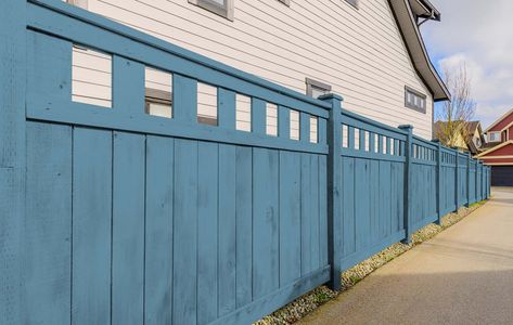 ​Wooden Fence Colors That Will Wow Your Neighbors Dark Blue Fence, Fence Stain Colors, Painted Sheds, Southern Landscapes, Fence Inspiration, Fence Murals, Fence Colors, Fence Colours, Farmhouse Fence