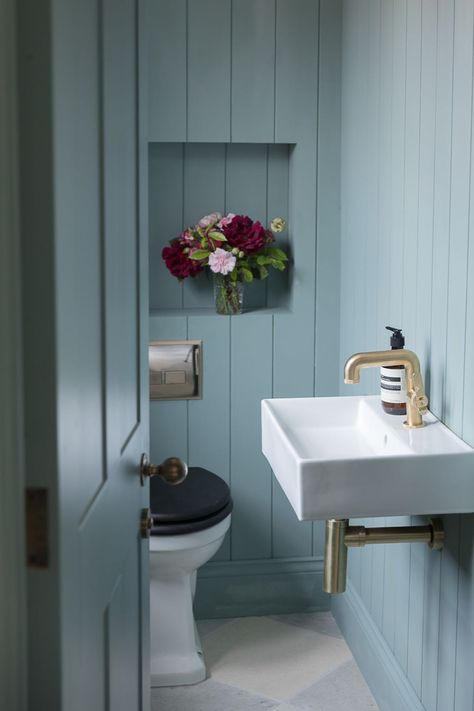 Who says minimal bathrooms can't include colour? Not us! How beautiful does this minimalist space look from @Belmark & Nightingale Ltd. The perfect inspiration for a small downstairs toilet room. Tap to shop Panelled Cloakroom Toilet, Blue Toilet Room, Cloakroom Toilet Ideas Downstairs Loo, Downstairs Toilet Ideas Quirky, Small Wc Ideas Downstairs Loo, Minimal Bathrooms, Blue Toilet, Wc Ideas, Small Downstairs Toilet