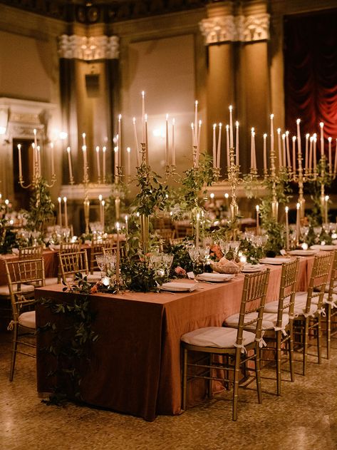 Alexandra and Dan’s winter wedding in NYC is overflowing with sentiment. Not only did the bride carry a cascading bouquet and wear an heirloom headpiece as a nod to her great grandmother’s wedding, the couple ultimately decided on the grand, former bank venue, built in the Gilded Age, for its history as the grandmother of… Winter Wedding In NYC With Exquisite Gilded Age Flair - Ruffled Vintage Wedding Indoor, Evermore Aesthetic Wedding, Romantic Academia Wedding, Gilded Age Wedding Theme, 1920s Wedding Aesthetic, Vintage Wedding Aisle, Light Academia Wedding, Gilded Age Decor, Gilded Age Wedding