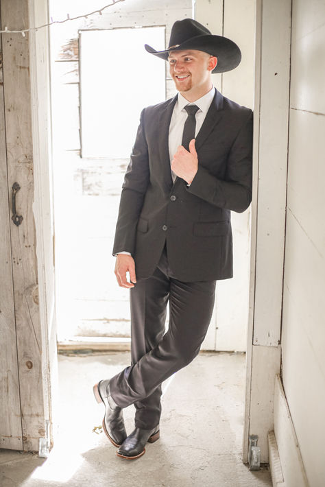 Looks for grooms Country wedding Black Suit Cowboy, Groom Attire Cowboy Boots, Wedding Suit With Cowboy Hat, Cowboy Hat Wedding Grooms, Groom In Cowboy Hat, Men’s Wedding Attire With Cowboy Boots, Cowboy Poses, Cowboy Wear, Groom Suit Black