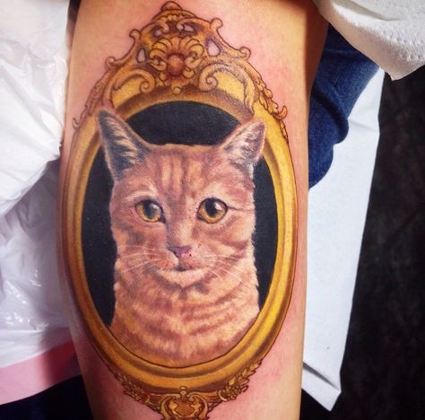 Cat portrait in frame tattoo. Gold Tattoo Ideas, Frame Tattoo, Cat Portrait Tattoos, Framed Tattoo, Gold Tattoo, Popular Now, Portrait Design, Realism Tattoo, Antique Frames