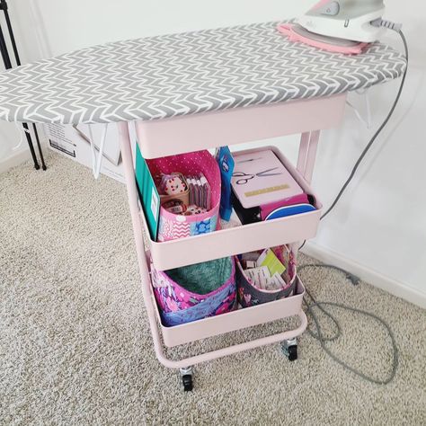 I made myself a little ironing board rolling cart for my little Oliso iron that can sit next to me at the sewing machine. I love it, and it was super easy. The ironing board I got Walmart and the Cart is from the Contrainer Store. I measured the top basket and went to Home Depot and had them cut 2 pieces of wood for me, and then I used zip ties to attach the boards to the table. It's not perfect, but I like that I can take the table off whenever I need to. #rollingcartorganization #irono... Ironing Board Ideas, Sewing Cart, Diy Ironing Board, Sit Next To Me, Ironing Table, Ironing Station, Mobile Cart, Craft Cart, Sewing Space