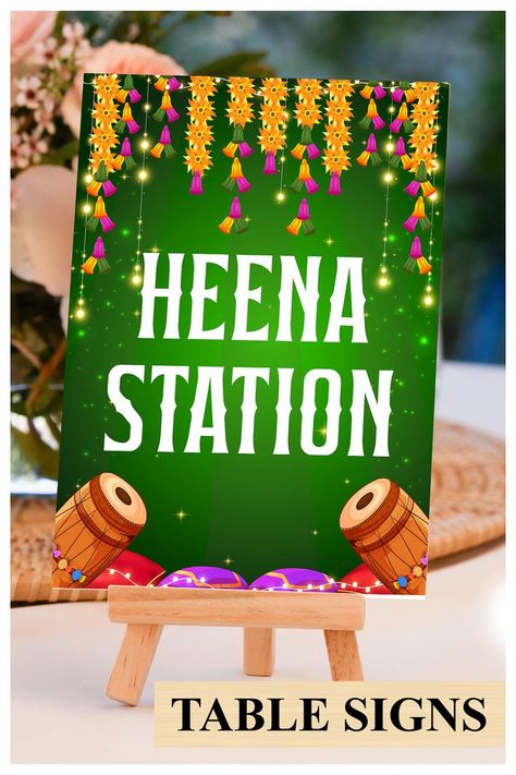 This beautiful Henna station sign or Indian wedding decor sign with mandala, from our Ethnic Fusion collection, lovingly created by us, is for those who would like to leave, not only a subtle, but also an impactful impression on their guests!

This DIY Henna station signs template or Jaggo decor as Dholki decoration, a fusion invite in traditional elegance, is complemented with indian colours & motifs, perfect for your Mehendi decoration Dholki Decoration, Henna Station, Decoration Indian Wedding, Mehndi Sign, Mehndi Decorations, Mehendi Decoration, Decor Indian Wedding, Indian Wedding Decor, Ribbon Box