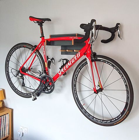 Handmade hardwood plywood bicycle rack with storage box.  Easy to install, perfect bicycle and accessories storage solution. All are handmade using 18mm hardwood plywood and 3mm cork to protect your frame. Dimensions approx: - Height 22cm - Width 36cm - Depth 30cm - Weight 3.3kg Perfect for a small house or flat or just a storage solution for your garage/shed. The bicycle rack has a storage box with a lid to put your helmet on top and all your gels and bars inside. It also comes with 3 oak woode Bike Hanger Wall, Rack Velo, Gym Organizer, Wall Mount Bike Rack, Bike Rack Wall, Bicycle Quotes, Bike Wall Mount, Wooden Bicycle, Bike Hanger