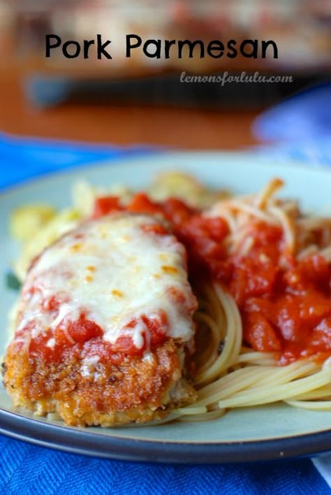 Pork chops are lightly breaded and seasoned then baked with gooey mozzarella cheese and covered in homemade marinara sauce.  www.lemonsforlulu.com Pork Parmesan, Homemade Marinara Sauce, Inexpensive Dinners, Breaded Pork Chops, Marinara Sauce Homemade, Pork Dinner, Homemade Marinara, Think Food, Pork Chop