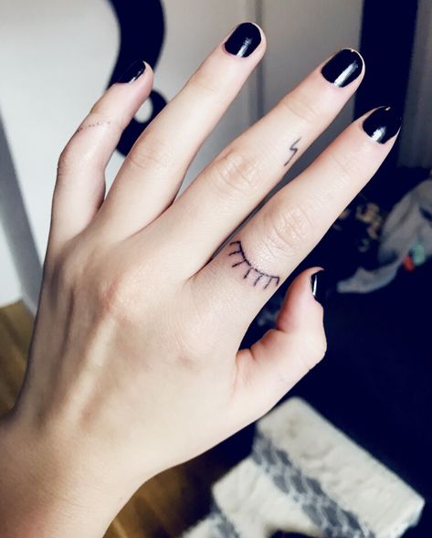 Tiny finger lash tattoo. Stick and poke tattoo Stick And Pokes On Fingers, Eyelash Tattoo Finger, Eye Tattoo Stick And Poke, Stick Amd Poke Idea, Stick And Poke Tattoo Example, Stick Amd Poke Tattoo Ideas, Eye Lash Tattoo, Middle Finger Tattoos, Finger Tattoo For Women