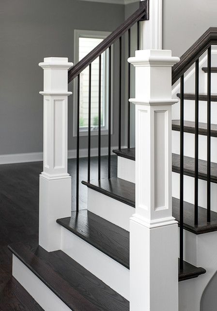 Stair Styles, Iron Stair Balusters, Banister Ideas, Black And White Stairs, Black Stair Railing, House Foyer, Furniture Color Schemes, Transitional Staircase, Staircase Styles