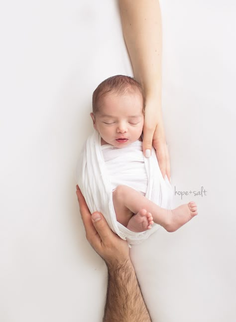 oakville newborn photographer - studio session with wrapped baby marco in mom and dads hands Salt Photography, Family And Baby, Baby Boy Newborn Pictures, Baby Boy Newborn Photography, Foto Newborn, Babies Photography, Newborn Photography Boy, Baby Pictures Newborn, Baby Photoshoot Boy