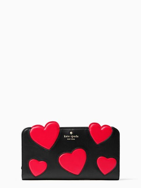 this new, heart-covered version of our adelina--a roomy, zip-around wallet with an interior zippered compartment and plenty of slots for your plastic--is equal parts whimsical and practical. Valentines Day Accessories, So Obsessed With Me, Cute Laptop Bags, Heart Shaped Bag, Rhinestone Handbags, Heart Applique, Bags Kate Spade, Novelty Bags, Heart Bag