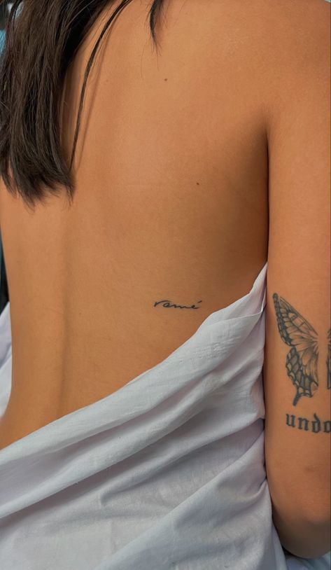 Tattoo Placement Ideas Wrist, Word Tattoos For Women Back, Tattoo Back Placement For Women, Amor Rib Tattoo, Minimal Tattoo Placement Ideas, Tiny Script Tattoo Placement, Arnell Armon Tattoos, Unique Tattoo Placement For Women Hidden, Back Ribs Tattoo