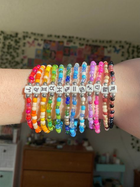 zodiac symbol seed bead bracelets🌈🌝choose your zodiac from the drop down menu :) these are made with elastic so they are stretchy and the size is 7 inches!