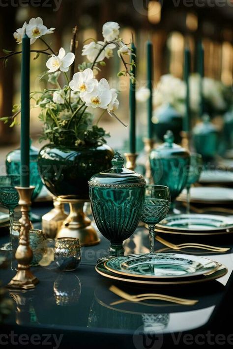 Detailed view of emerald green themed tablescape for a chic wedding reception Emerald Green Peacock Wedding, Emerald Green Backyard Wedding, Emerald City Wedding Theme, Moody Green Christmas, Emerald Green Tablescape, Navy Emerald Gold Wedding, Dark Green Tablecloth Wedding, Emerald Wedding Centerpieces, Green Gold Table Setting