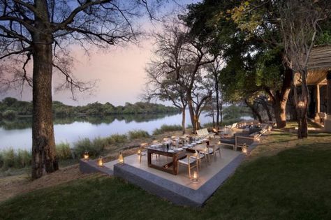 Nestled on an exclusive stretch of the Zambezi River, the exquisite Matetsi River Lodge offers the unique experience of rich views of wildlife as well as captivating experiences of the Victoria Falls. It celebrates the region's fascinating heritage with authentic features and effortlessly... Safari House, Lakeside Cafe, Resort Design Plan, River Restaurant, Lakeside Restaurant, River Resort, Open Restaurant, Hotel Garden, Lodge Design