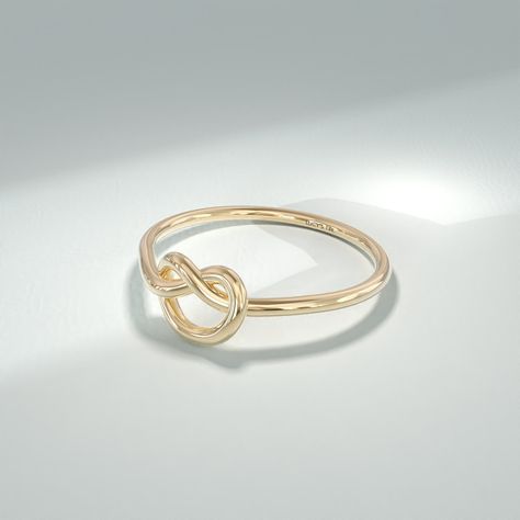 14k 10k 18k Real Solid Gold Delicate Dainty Love Knot Promise Knot Minimalist Tiny Stacking Ring is available in Yellow White Rose Gold. Whether as a promise ring, a token of commitment, or a meaningful gift, this ring carries profound sentiments that make it a cherished piece of jewelry.  The ring can be made with yellow, rose, or white gold, please choose your size from the dropdown menu options above. 𝐑𝐢𝐧𝐠 𝐃𝐞𝐭𝐚𝐢𝐥𝐬 ❥ Solid gold, available in 10, 14 & 18 karats. ❥ Gold Color Options: White Gold, Yellow Gold, Rose Gold ❥ Band Width: 1.15 mm ❥ Top Width: 5.60x8.50 mm ❥ Thickness: 1.25 mm 𝐂𝐮𝐬𝐭𝐨𝐦𝐢𝐳𝐚𝐭𝐢𝐨𝐧: We would be delighted to accommodate any customization requirements that you have, simply get in touch and let us know what you need. For further personalization, gems A Promise Ring, Friendship Ring, Love Knot Ring, Friendship Rings, Infinity Ring, Knot Ring, Rose Gold Band, Love Knot, Ring Women