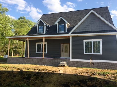 Most recent picture of outside. We went with twilight shadow vinyl siding and a pewter shake. White trim really makes this color pop! Timeless Vinyl Siding Colors, Steel Siding Exterior House Colors, Twilight Shadow Vinyl Siding, Exterior House Options, Georgia Pacific Vinyl Siding, White Vinyl Siding, Siding Colors For Houses, Exterior Siding Options, Vinyl Siding Colors