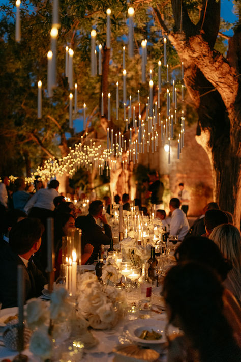 Lighting decoration for wedding dinner in the garden with Floating Candles. #weddingmusicandlights #weddingidea #weddingidea Floating Candle Ideas For Wedding, Making Candles Aesthetic, Floating Candles Ceiling, Candle Heavy Wedding, Candle Light Wedding Reception, Wedding Floating Candles, Hanging Candles Wedding, Candle Lit Wedding Ceremony, Candle Light Aesthetic