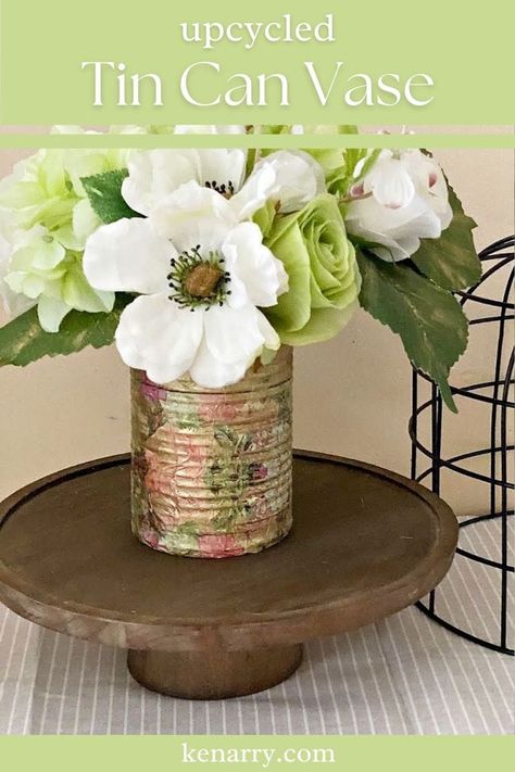 Create a Beautiful Upcycled Tin Can Vase in Minutes Flower Arrangements In Tin Cans, Tin Can Floral Arrangements, Decoupage Tin Cans Diy, Tin Can Flower Pots, Diy Artificial Flower Arrangements, Tin Can Vase, Upcycled Vase, Tin Can Centerpieces, Diy Floral Centerpieces