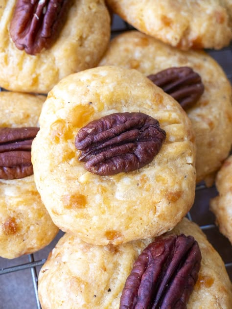 Southern Pecan Cheese Wafers?utm_source=12tomatoes Candied Pecan Brie Bites, Puff Pastry Pecan Bites, Crispy Cheese Wafers, Southern Pecan Cheese Wafers, Cheese Wafers Recipe, Candied Pecan & Cranberry Brie Bites, Cheese Wafers, Savory Cookies, Acorn Cookies